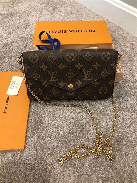 black louis vuitton purse with gold chain